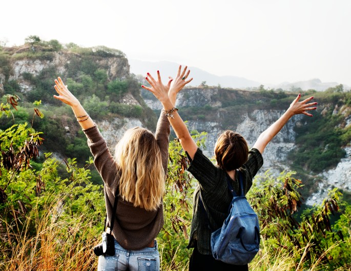 Young Women Travel Together Concept